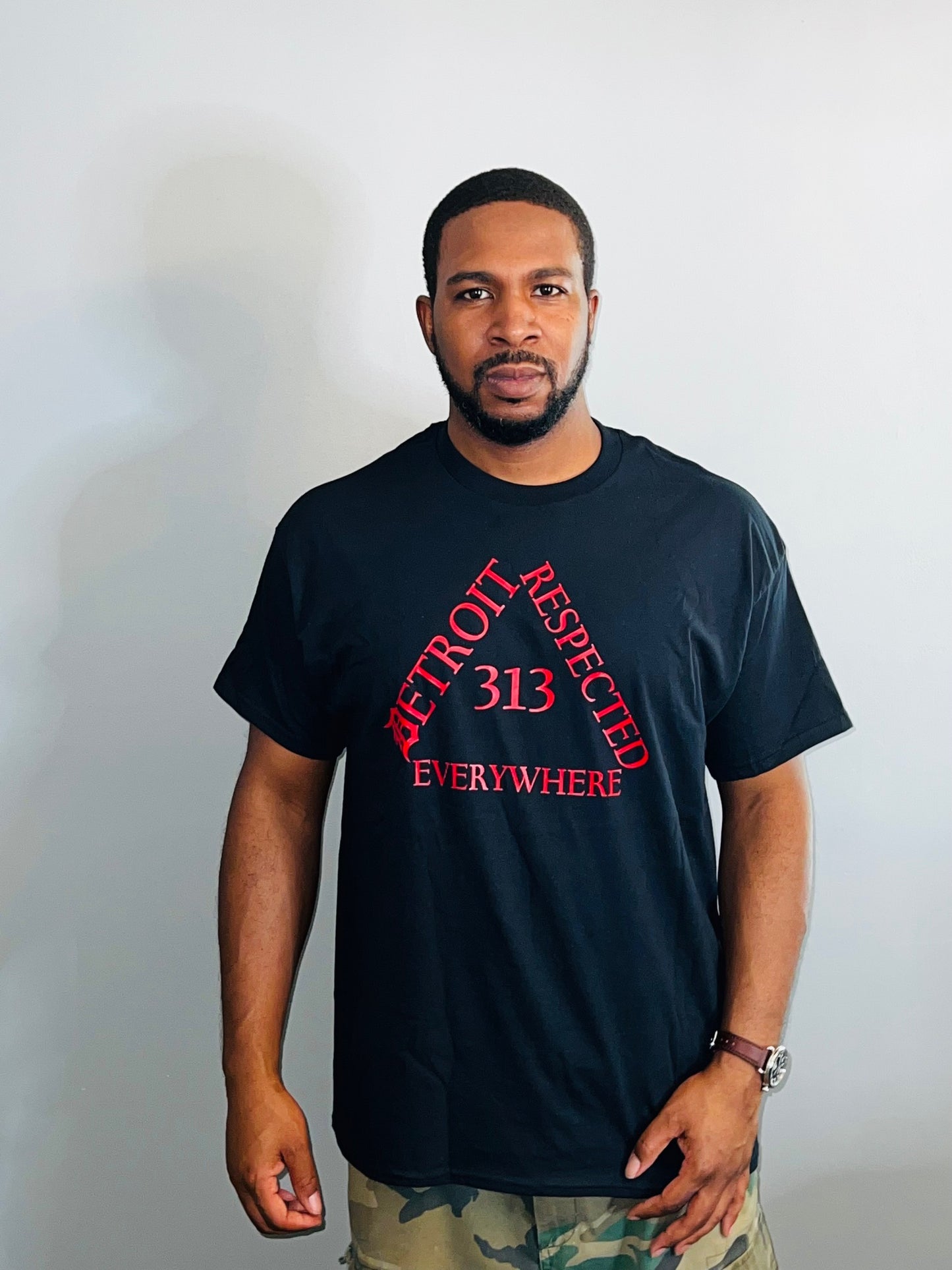 Black Triangle w/ Red letters