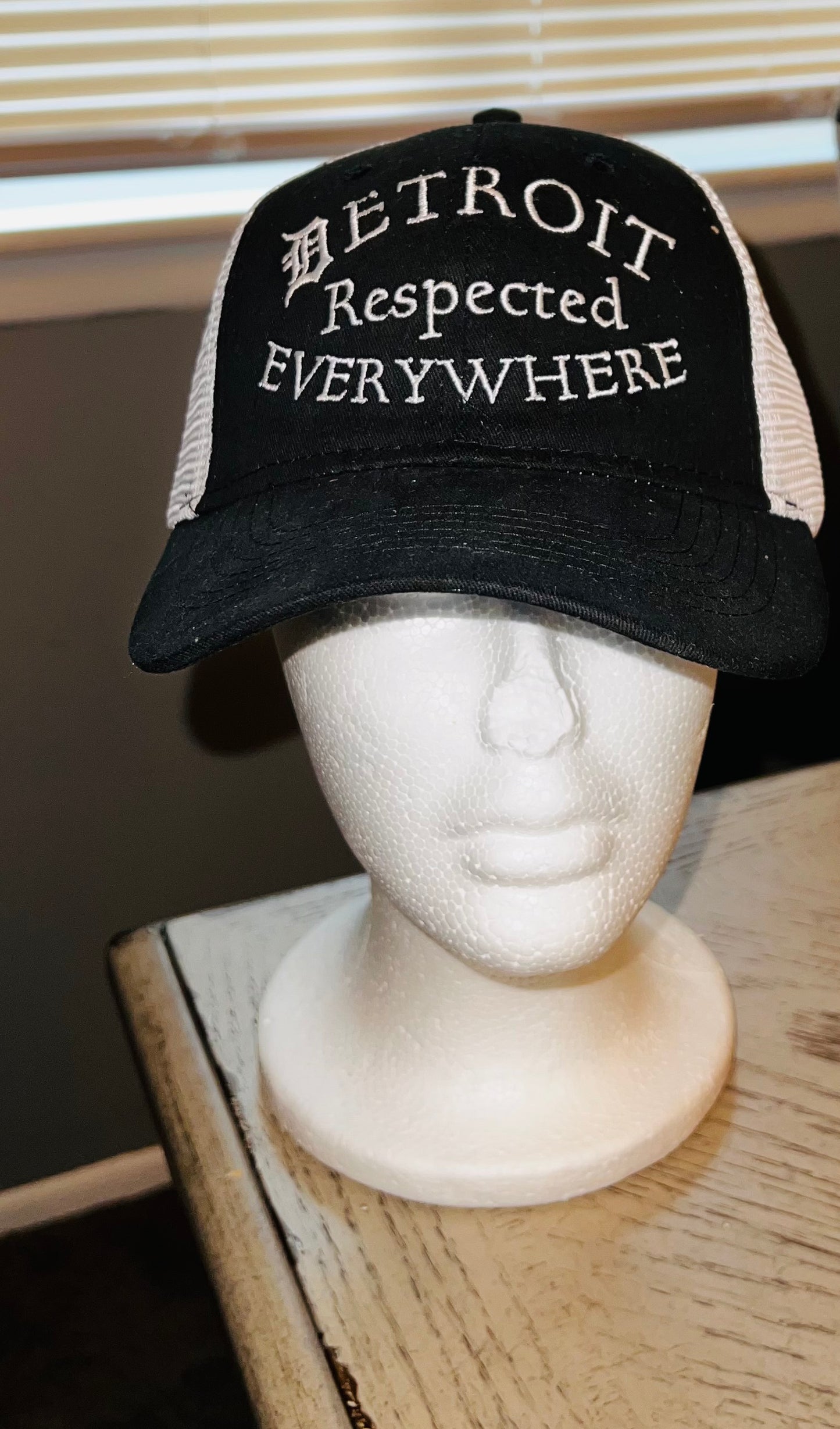 Respected Half Moon Trucker Hat Black